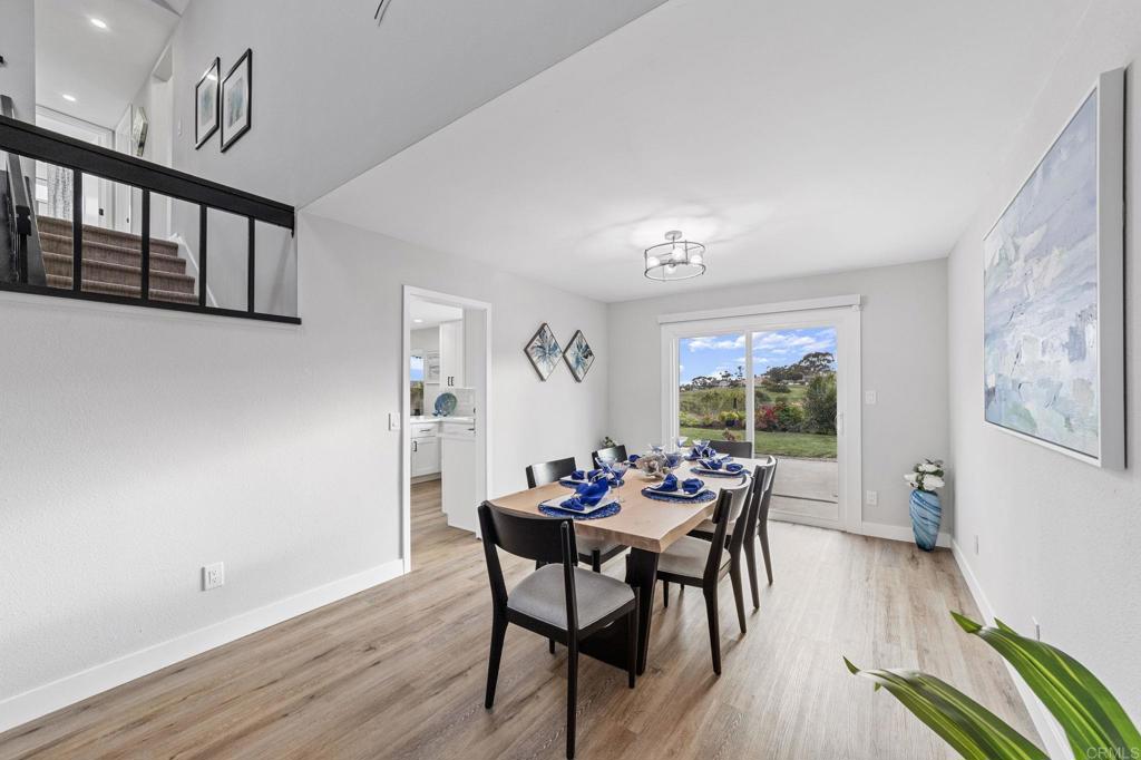 460 Compass Road Oceanside, CA 92054 - Photo 9 of 45 a view of a dining room with furniture window and wooden floor