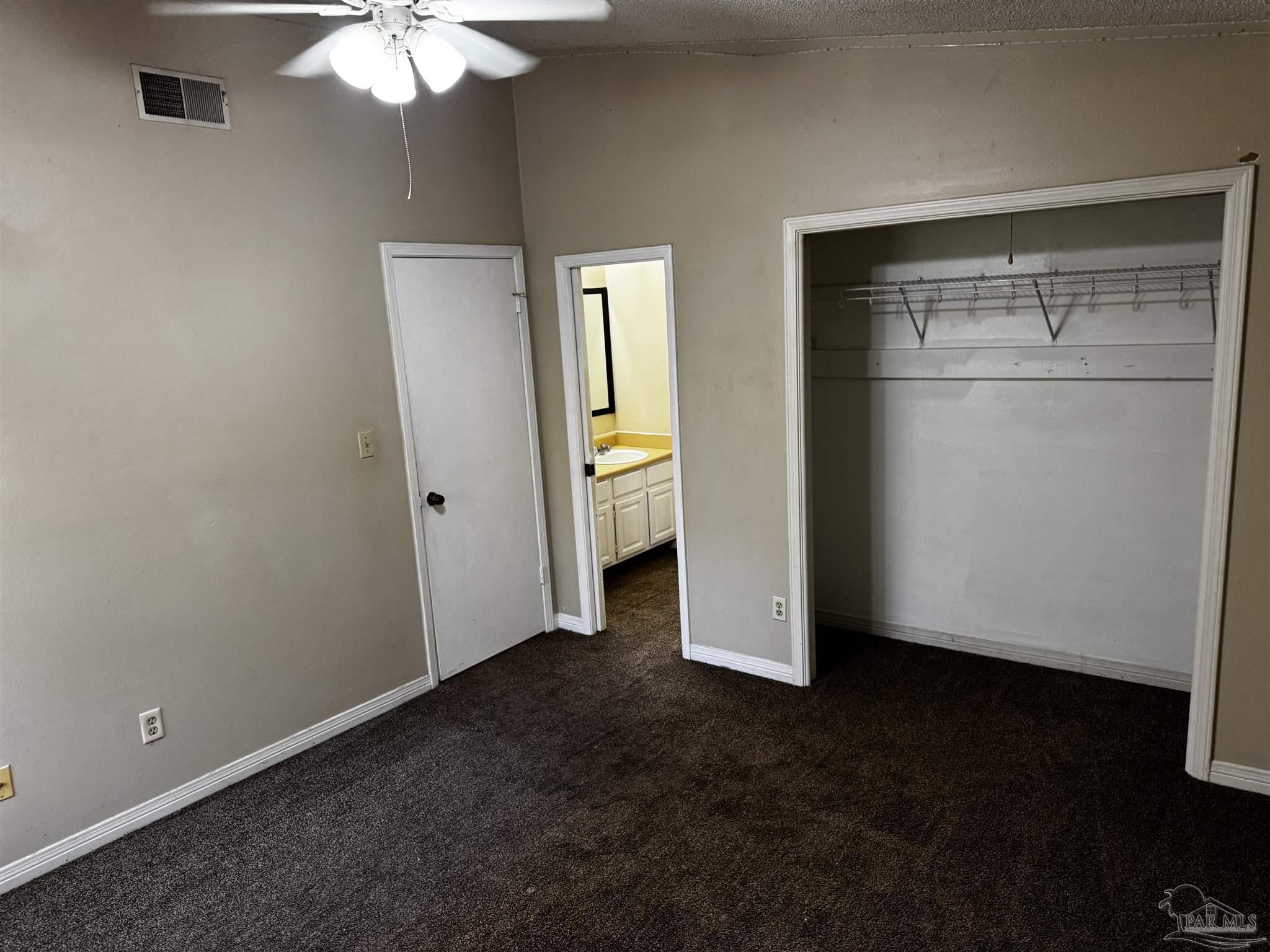 8210 Kipling Street, Unit B Pensacola, FL 32514 - Photo 10 of 17 a view of an empty room with a bathroom