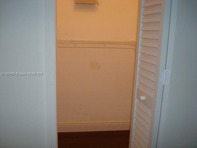 18230 Mediterranean Boulevard, Unit 1306 Hialeah, FL 33015 - Photo 11 of 15 a view of walk in closet