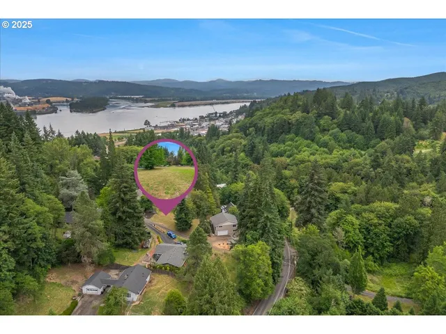 a view of a lake with a yard