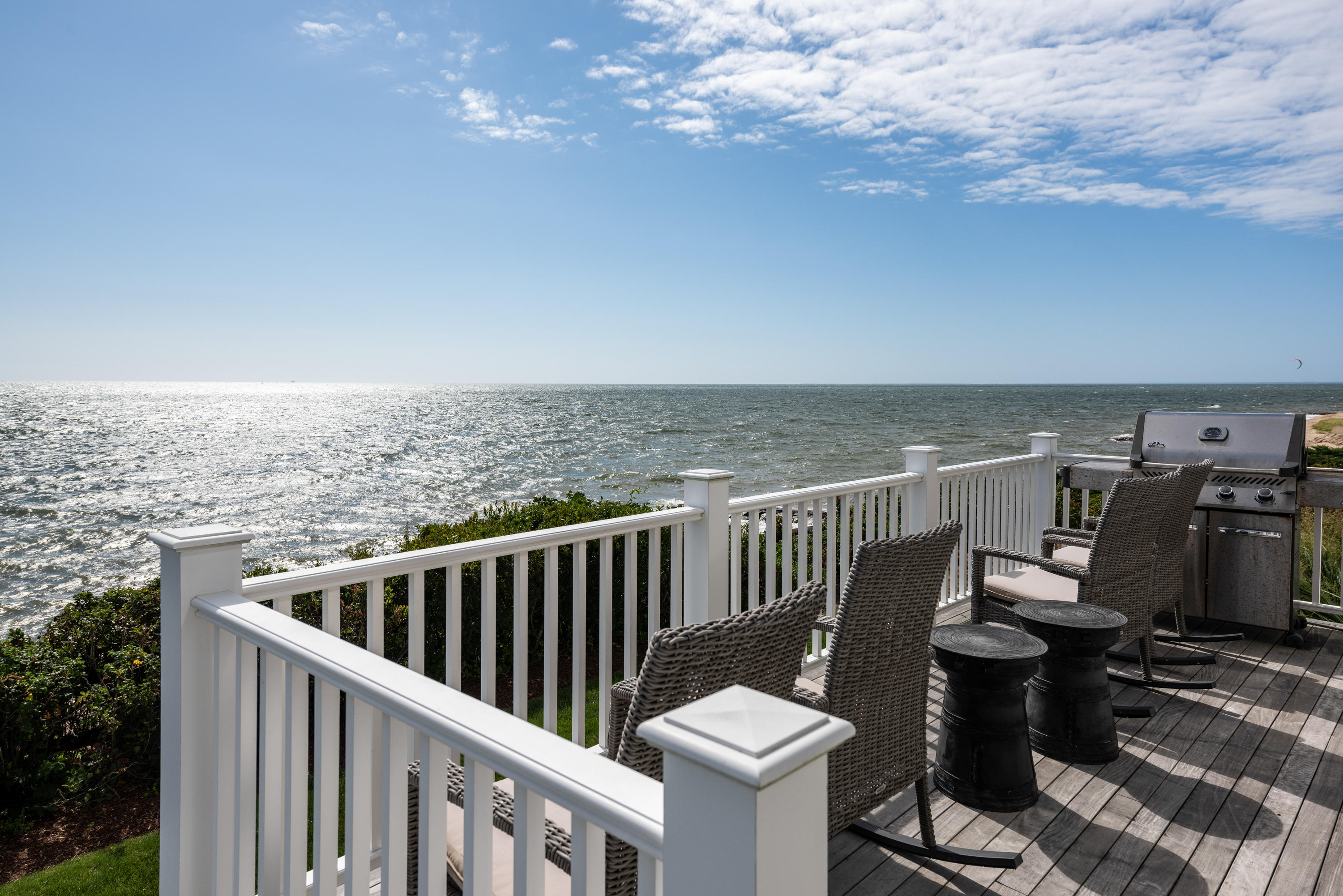 31 Starboard Lane Mashpee, MA 02649 - Photo 11 of 49 a roof deck with wooden floor and fence