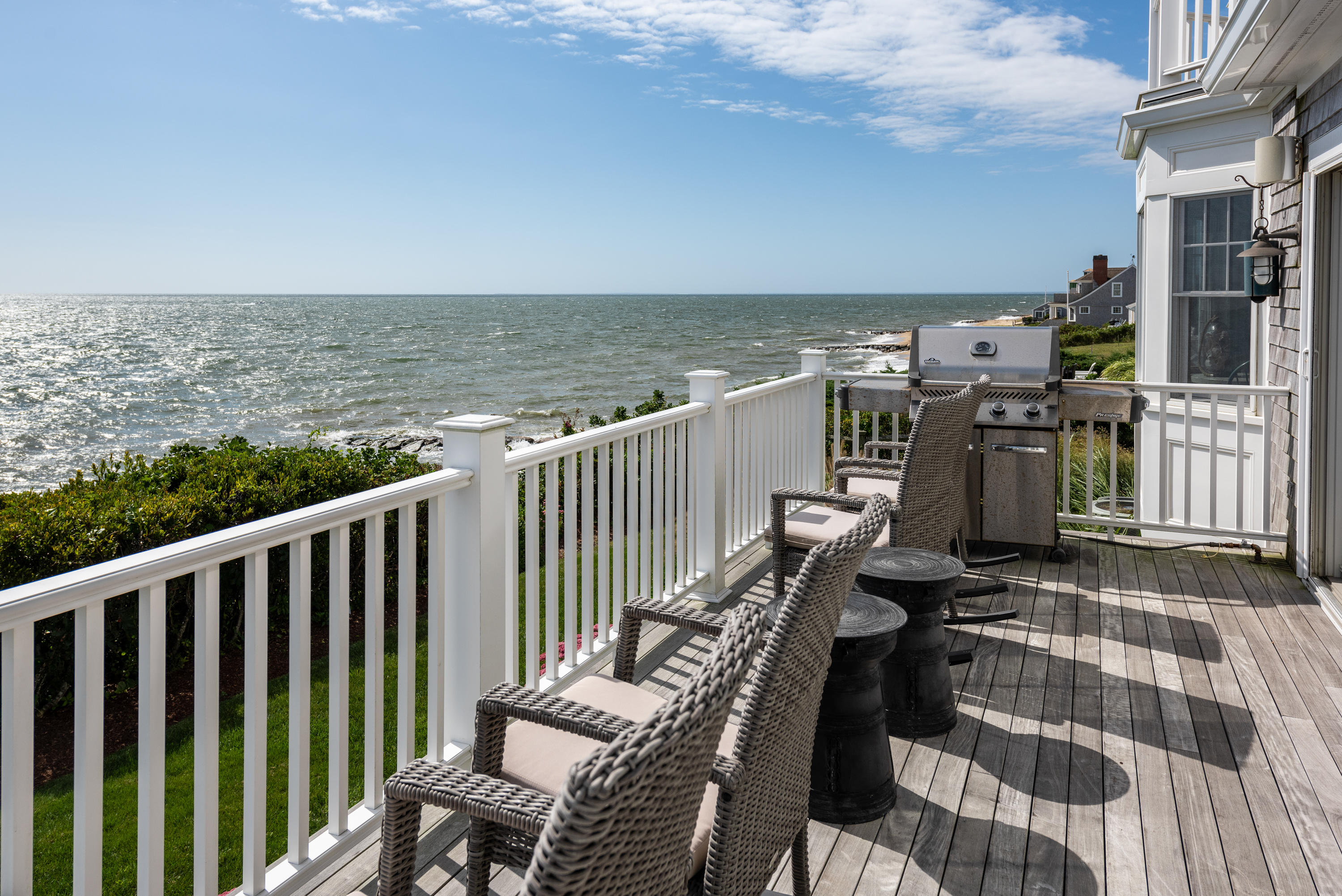 31 Starboard Lane Mashpee, MA 02649 - Photo 15 of 49 a view of a balcony with chair and wooden floor