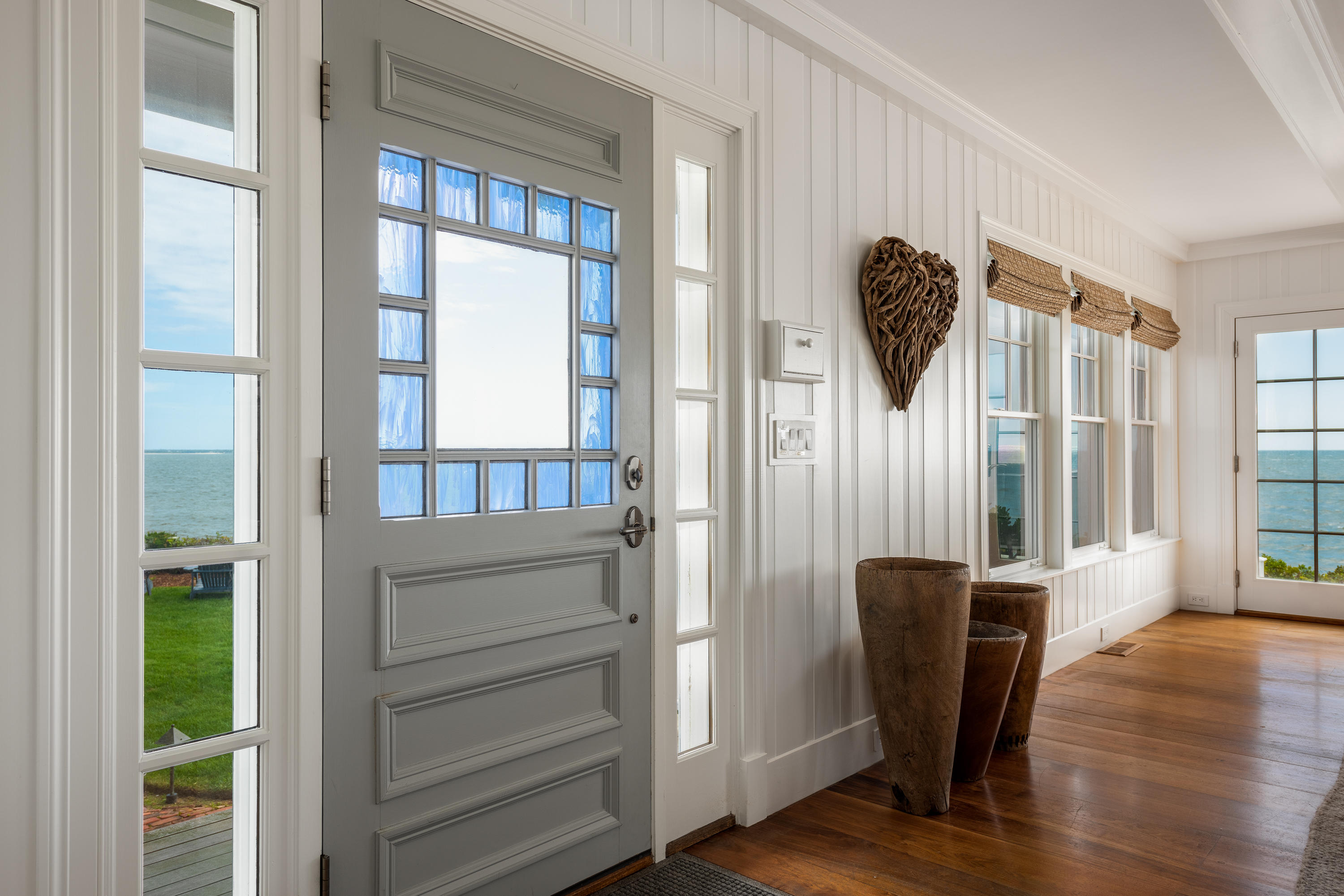 31 Starboard Lane Mashpee, MA 02649 - Photo 20 of 49 a view of a hallway with wooden floor and windows