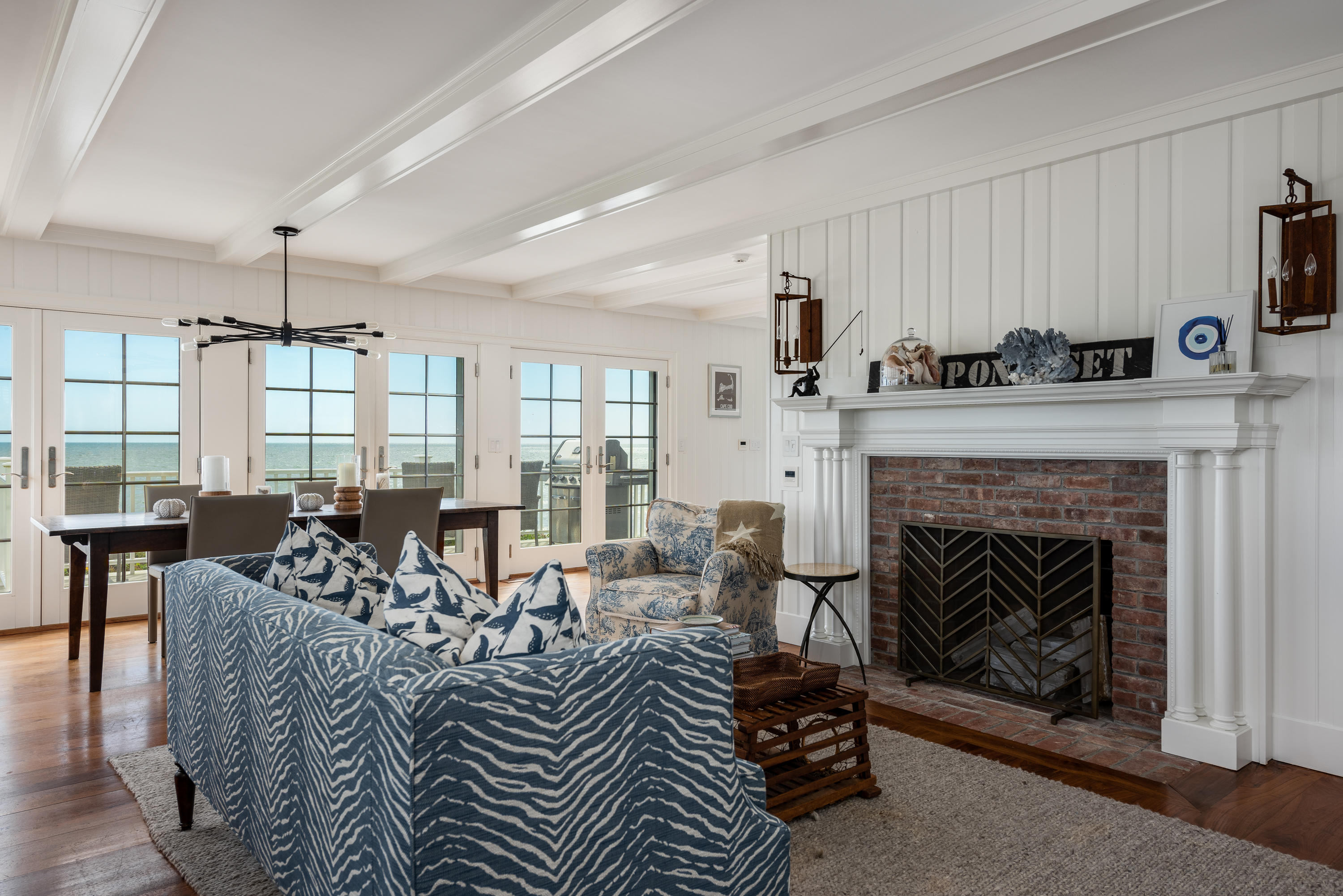 31 Starboard Lane Mashpee, MA 02649 - Photo 21 of 49 a living room with furniture a fireplace and a window