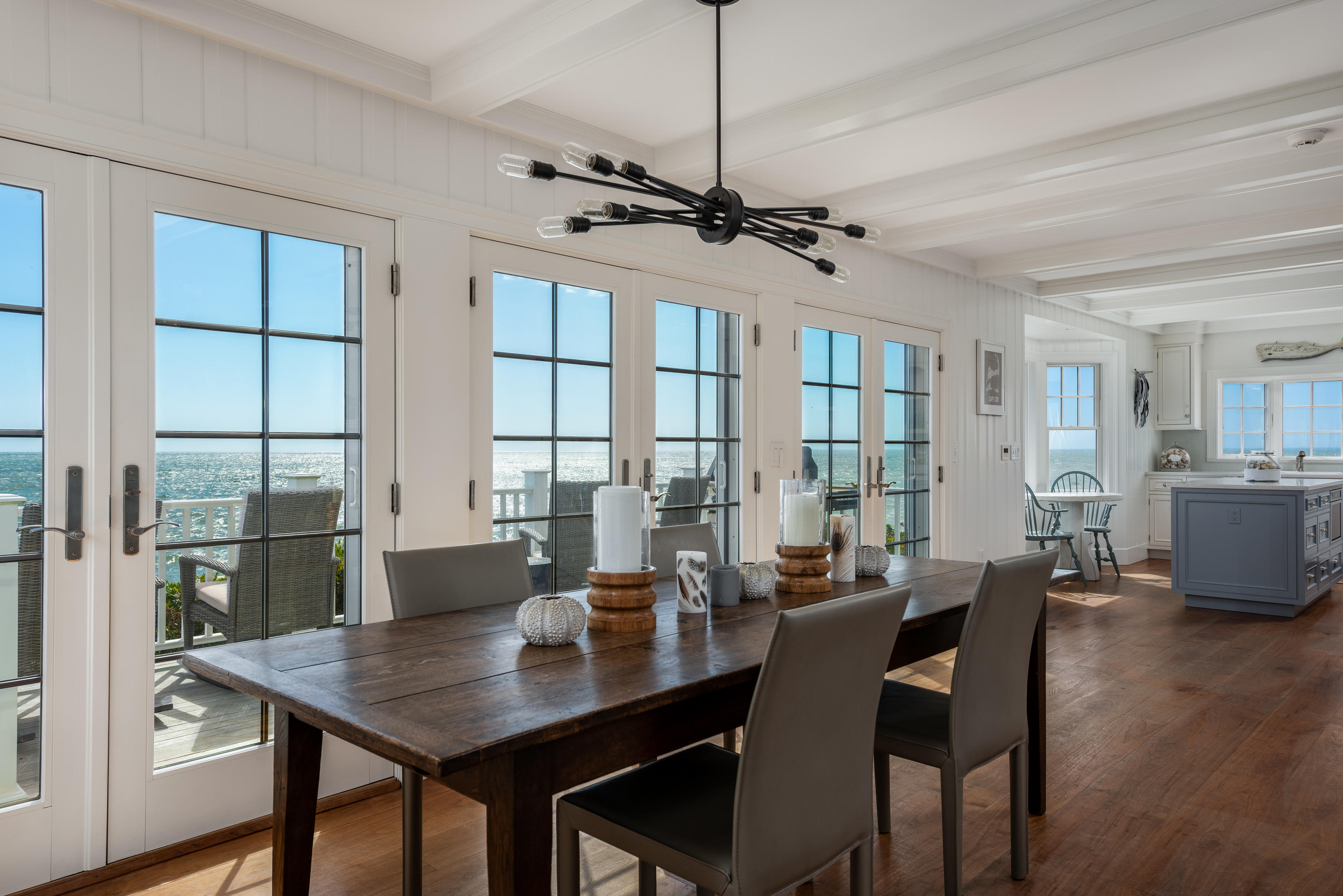31 Starboard Lane Mashpee, MA 02649 - Photo 26 of 49 a view of a dining room with furniture window and wooden floor