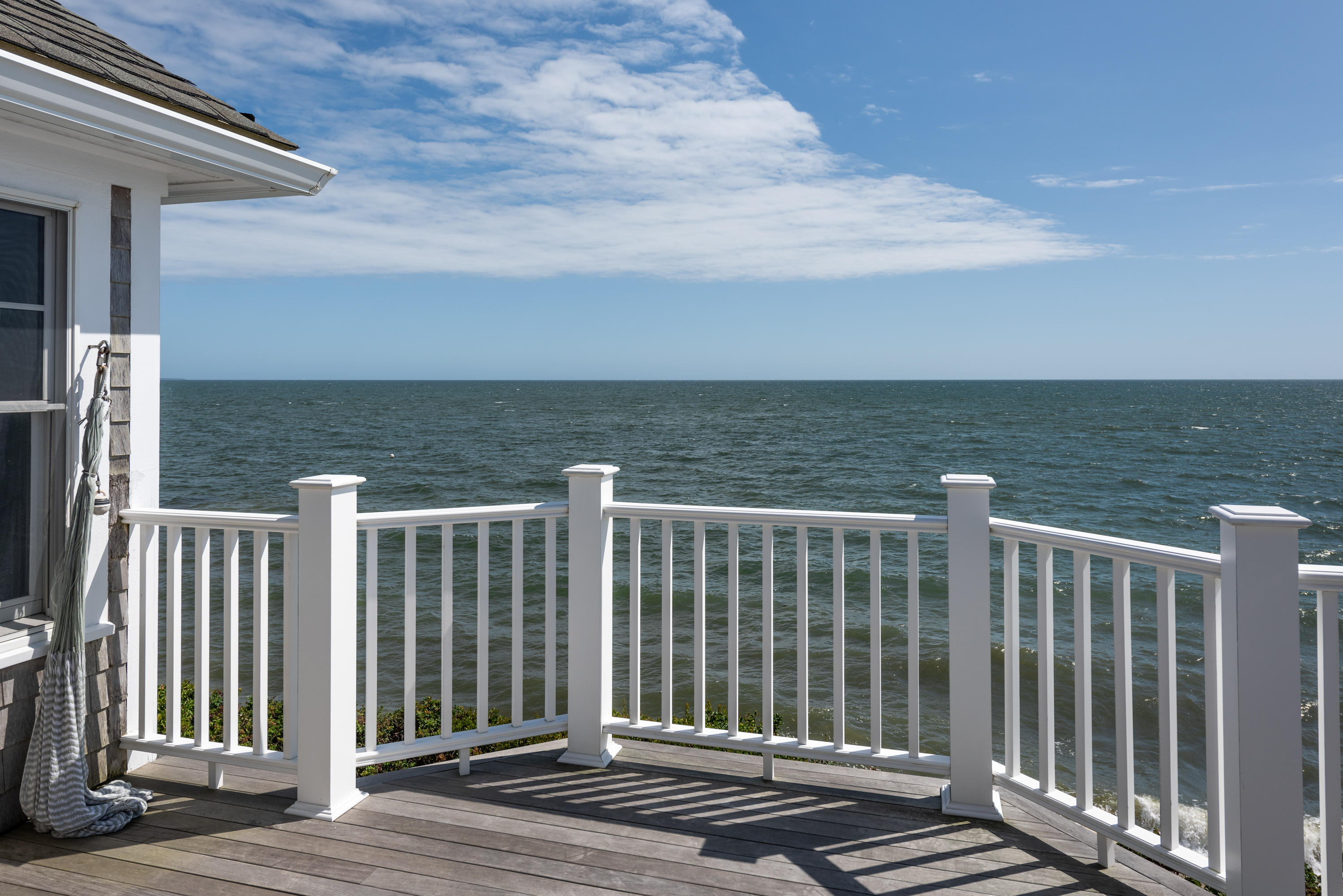 31 Starboard Lane Mashpee, MA 02649 - Photo 33 of 49 a view of a balcony with wooden floor