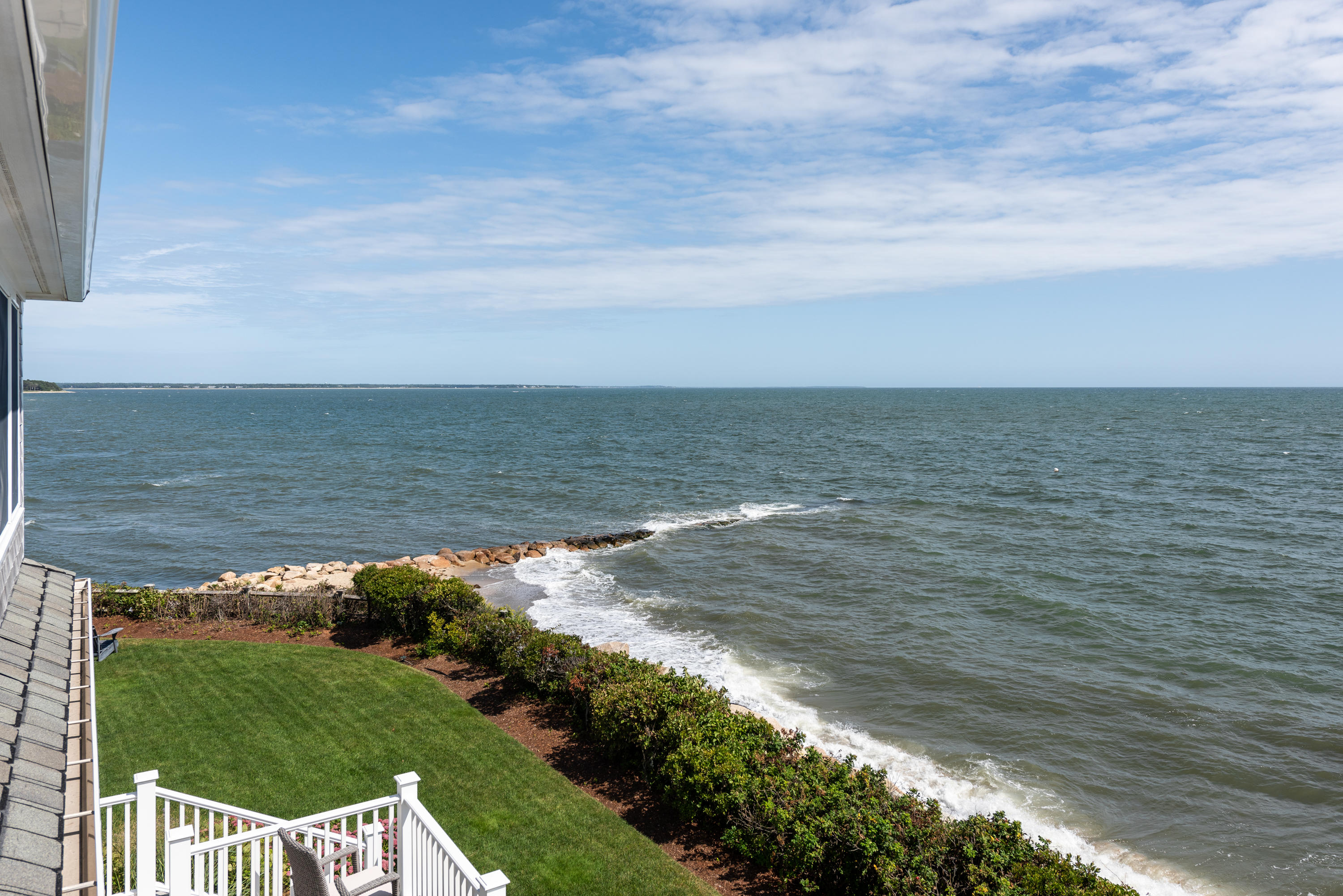 31 Starboard Lane Mashpee, MA 02649 - Photo 34 of 49 a view of a lake with a yard