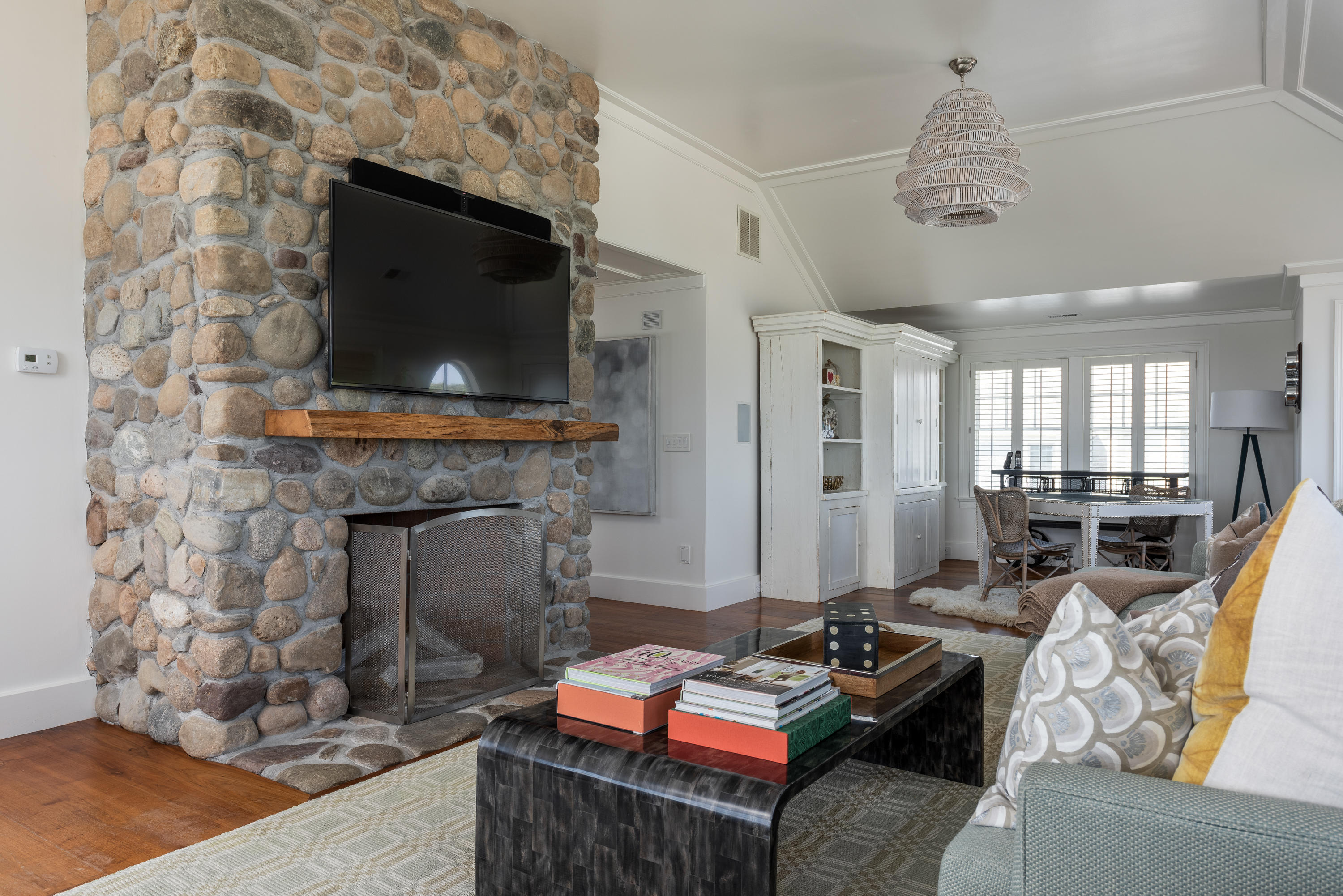 31 Starboard Lane Mashpee, MA 02649 - Photo 37 of 49 a living room with furniture a flat screen tv and a fireplace