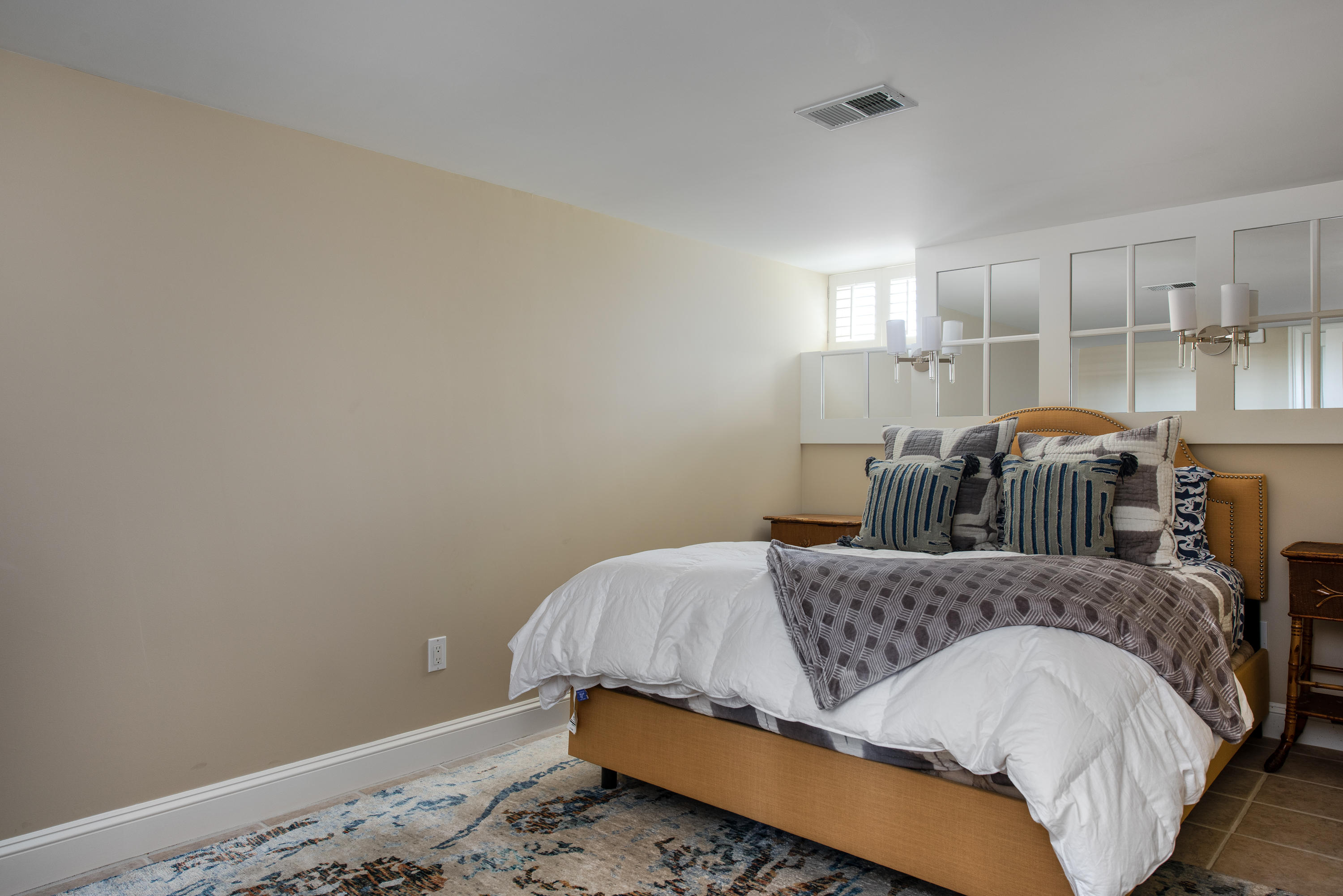 31 Starboard Lane Mashpee, MA 02649 - Photo 43 of 49 a bedroom with a bed and wooden floor