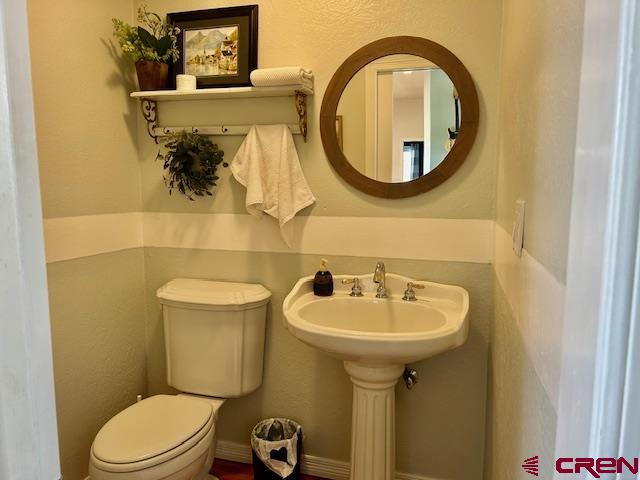 16609 Columbine Lane Cedaredge, CO 81413 - Photo 38 of 39 a bathroom with a sink and a mirror
