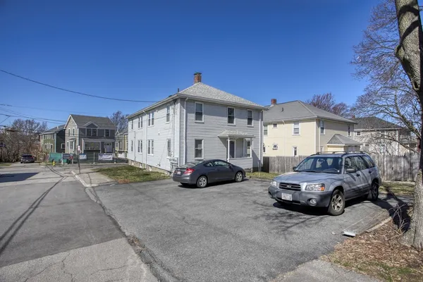 a car parked in front of a house