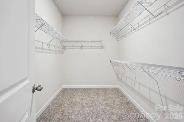 a view of a room with racks on the wall