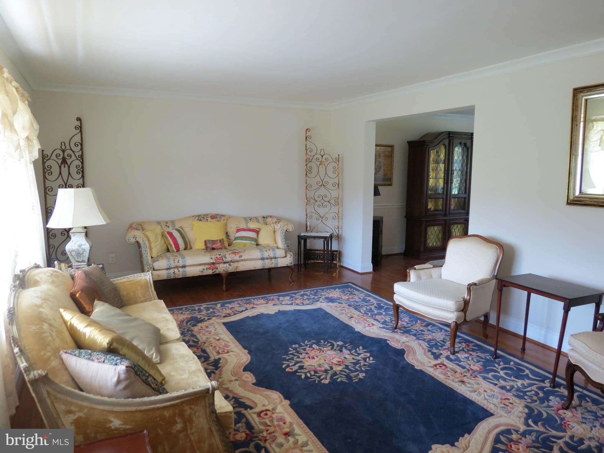 14711 Manor Road Phoenix, MD 21131 - Photo 8 of 30 Large Formal Living Room with Gleaming Hardwoods