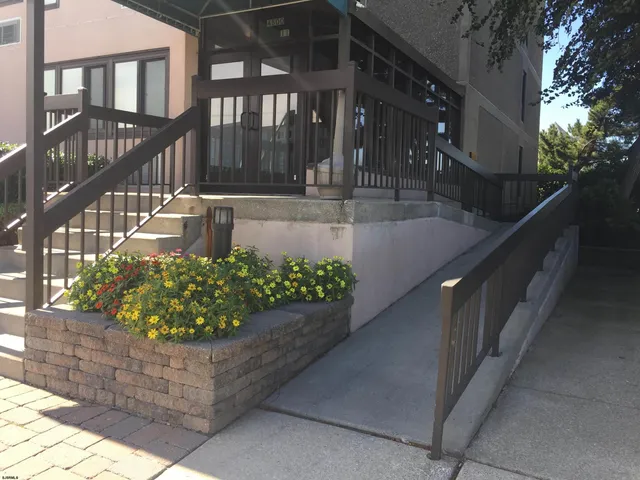 a view of a porch with a bench