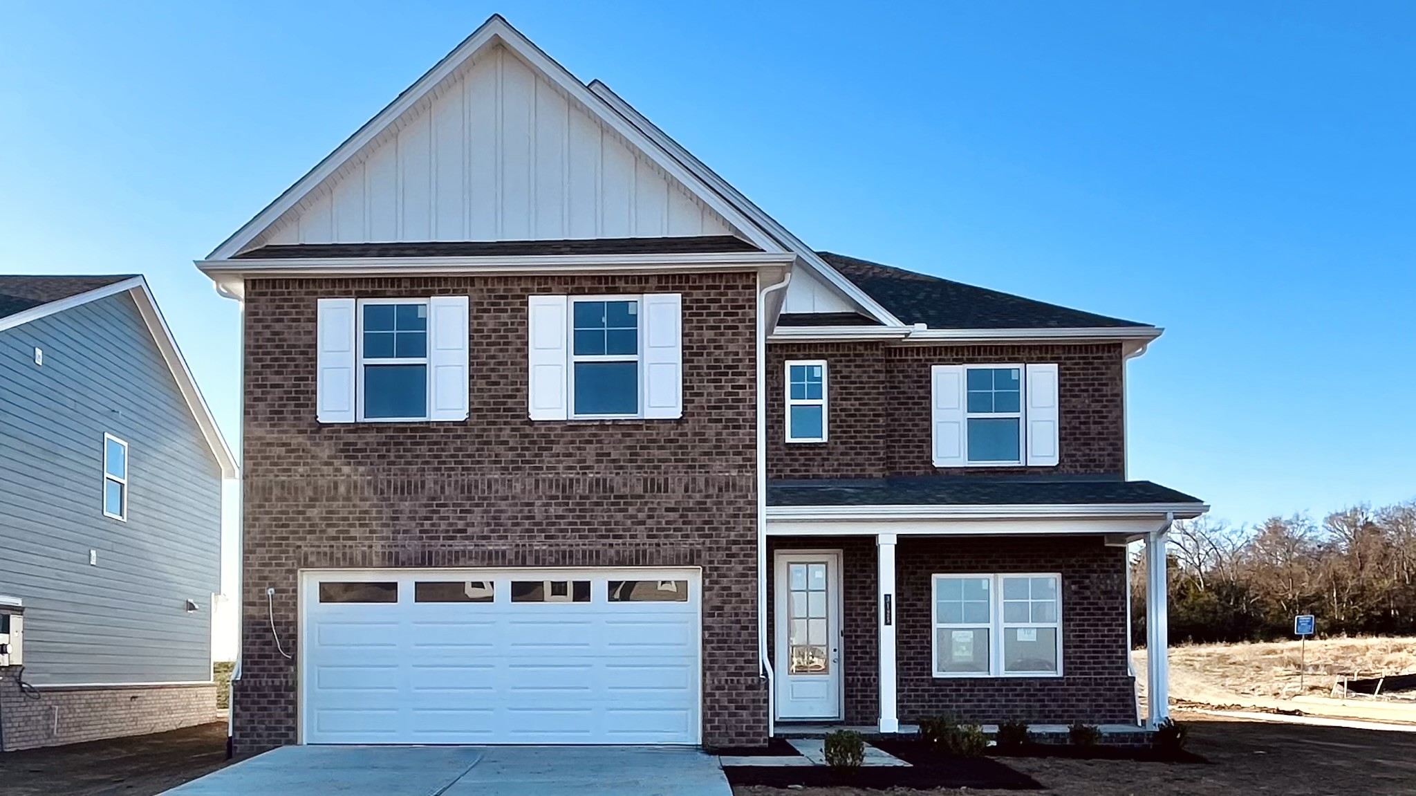 3125 Arbor Valley Rd Spring Hill Spring Hill, TN 37174 - Photo 1 of 14 a front view of a house with garden