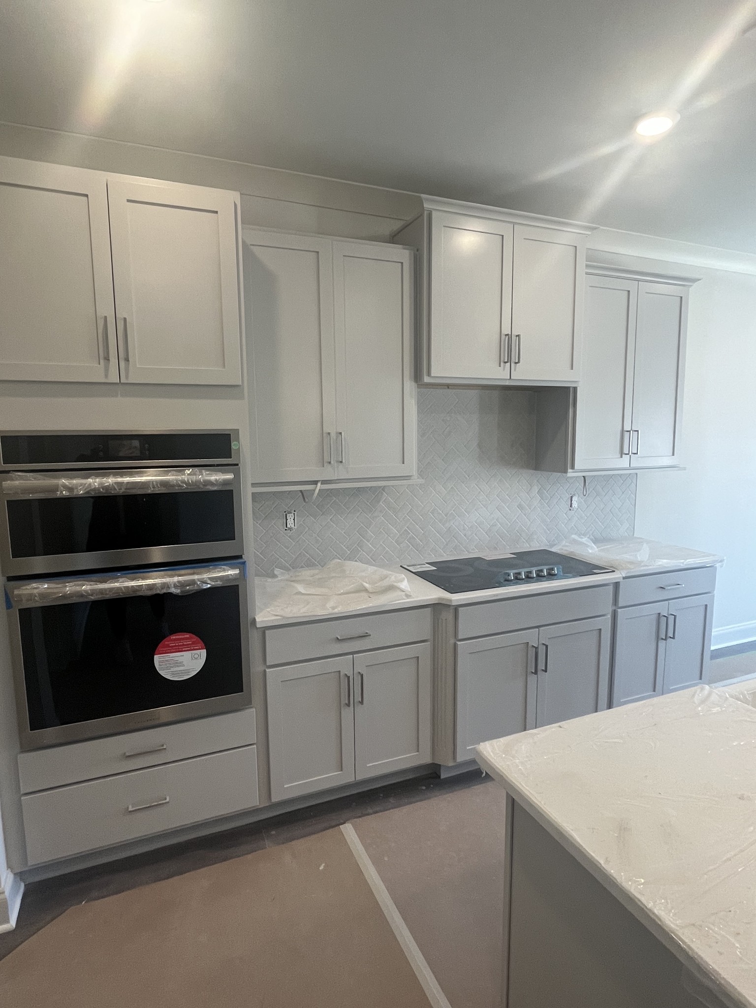 3125 Arbor Valley Rd Spring Hill Spring Hill, TN 37174 - Photo 5 of 14 a kitchen with white cabinets and appliances