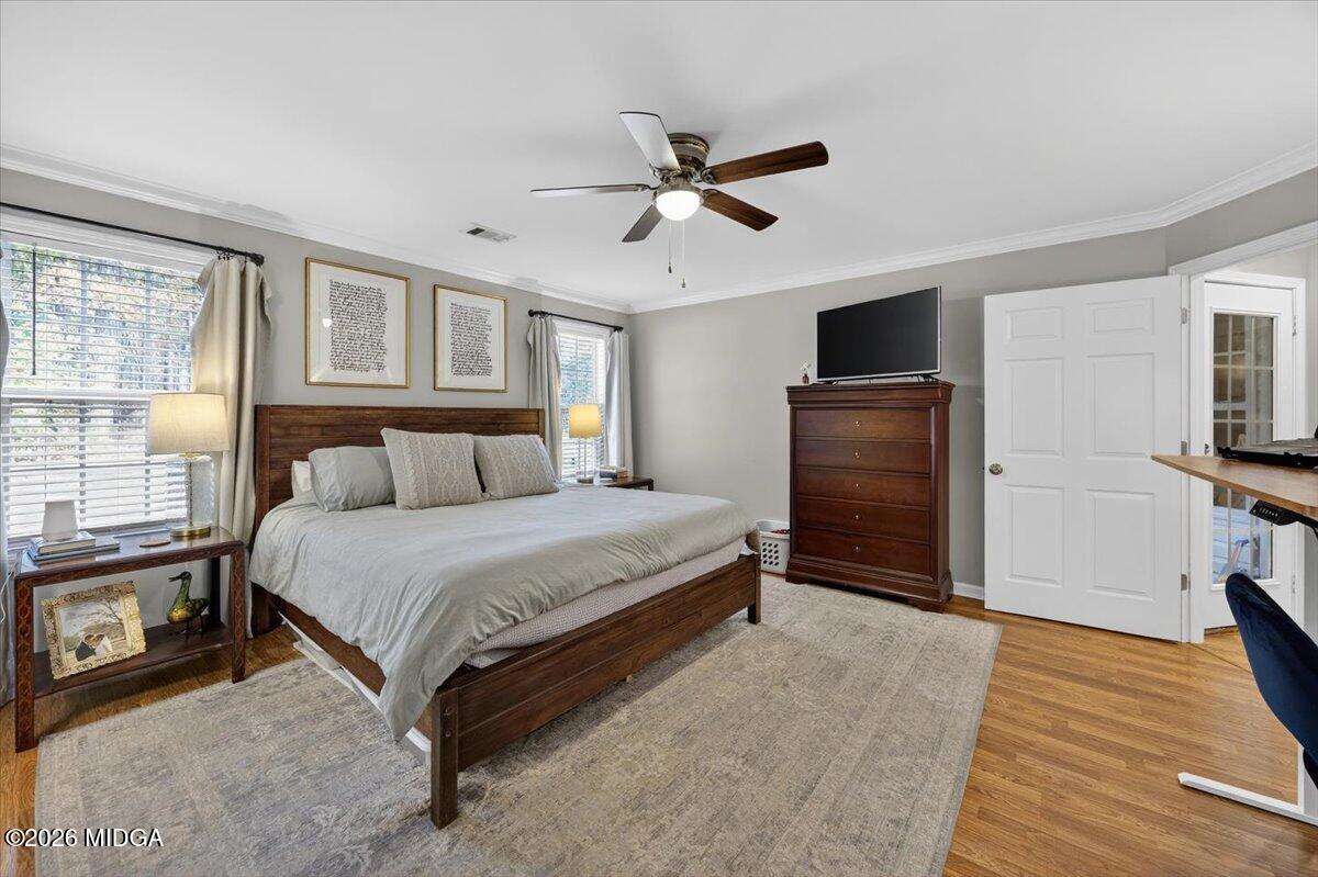 428 Fairview Church Road Forsyth, GA 31029 - Photo 12 of 35 a bedroom with a bed closet and a window