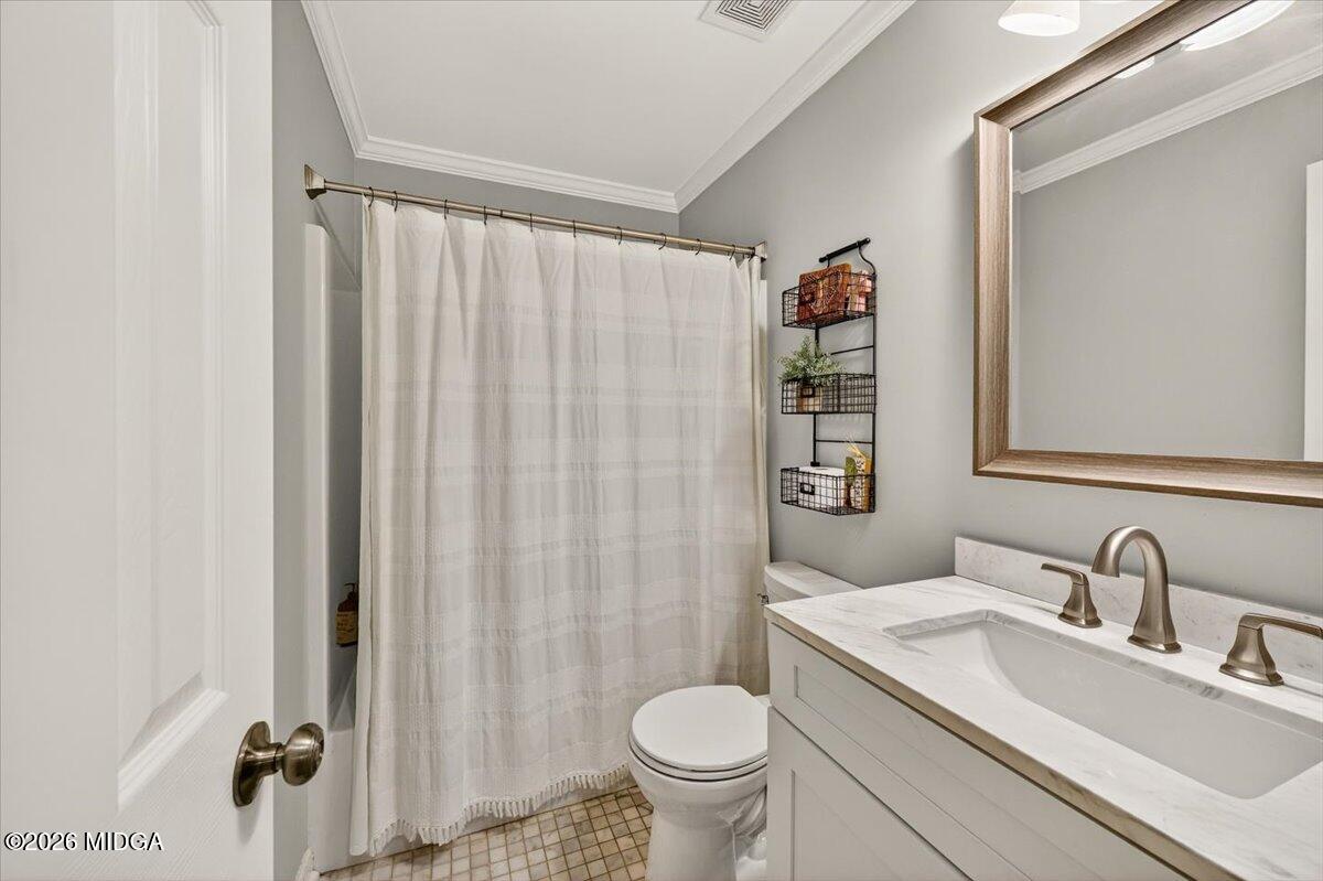 428 Fairview Church Road Forsyth, GA 31029 - Photo 17 of 35 a bathroom with a sink toilet and shower