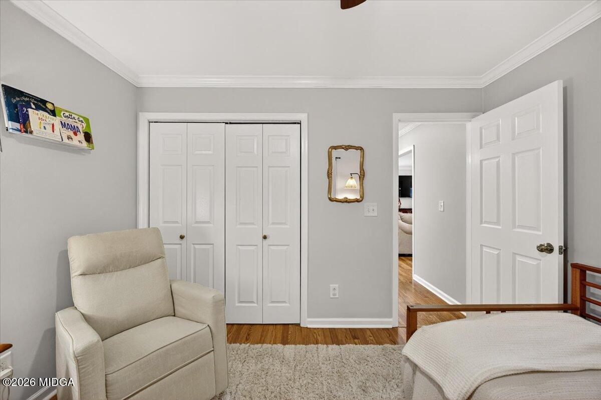 428 Fairview Church Road Forsyth, GA 31029 - Photo 19 of 35 a bedroom with furniture and a window