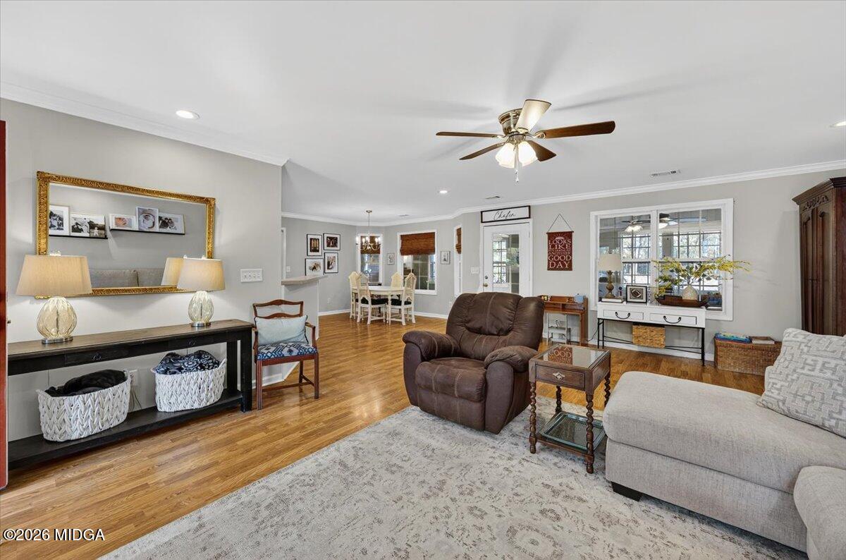 428 Fairview Church Road Forsyth, GA 31029 - Photo 2 of 35 a living room with furniture and a wooden floor