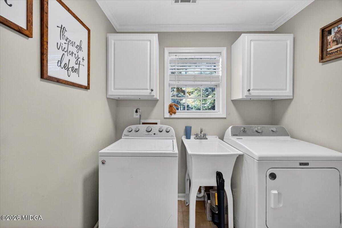 428 Fairview Church Road Forsyth, GA 31029 - Photo 22 of 35 a utility room with dryer and washer