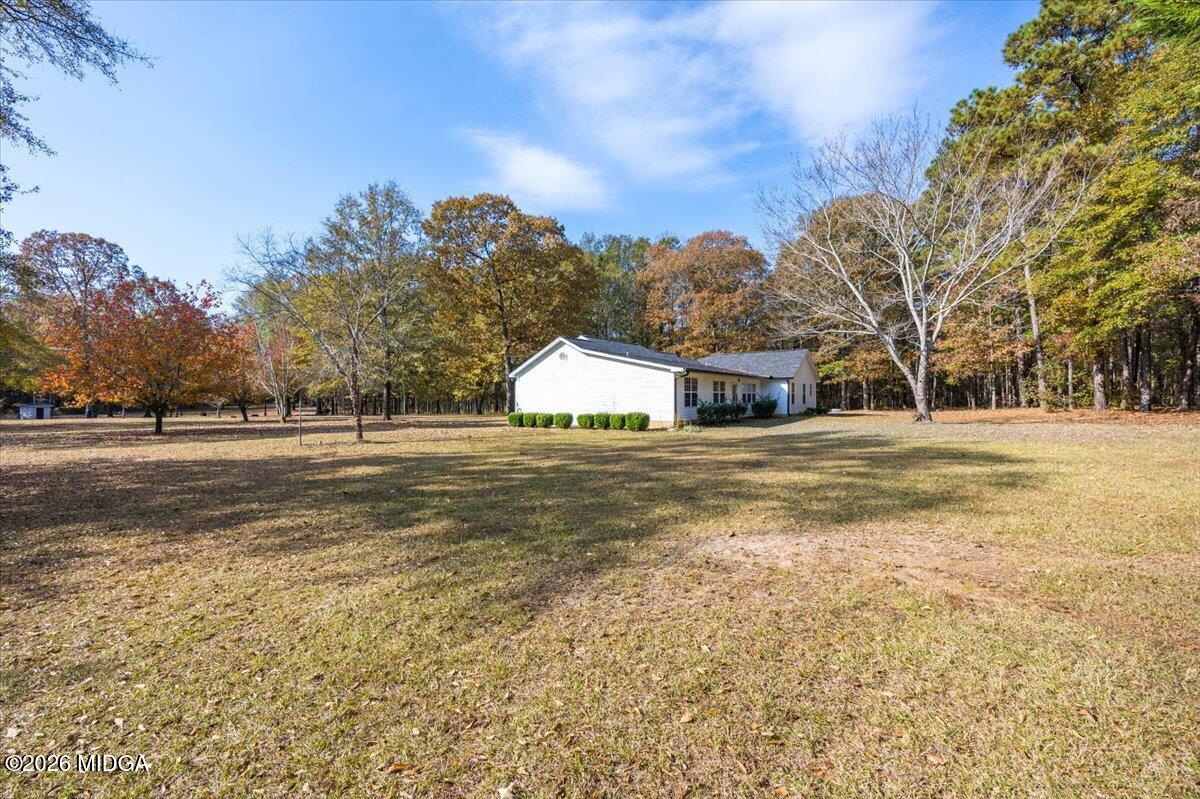 428 Fairview Church Road Forsyth, GA 31029 - Photo 28 of 35 a house view with a lake view