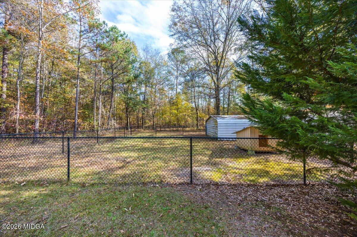 428 Fairview Church Road Forsyth, GA 31029 - Photo 30 of 35 a view of a yard with swimming pool