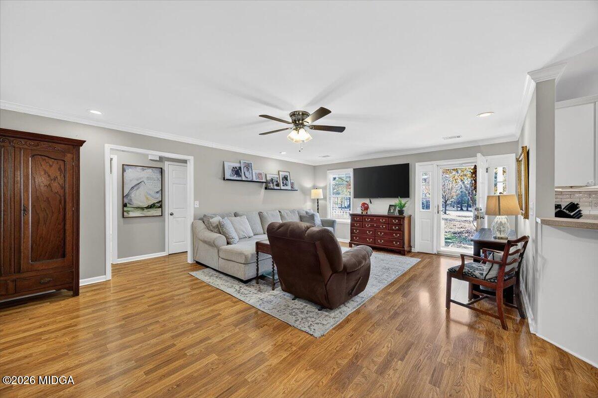 428 Fairview Church Road Forsyth, GA 31029 - Photo 3 of 35 a living room with furniture and a flat screen tv