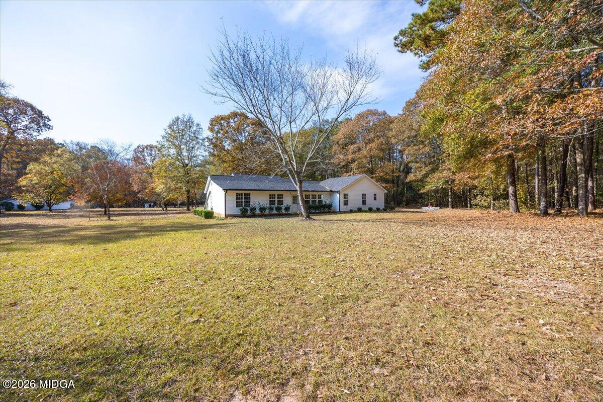 428 Fairview Church Road Forsyth, GA 31029 - Photo 31 of 35 a house view with large trees