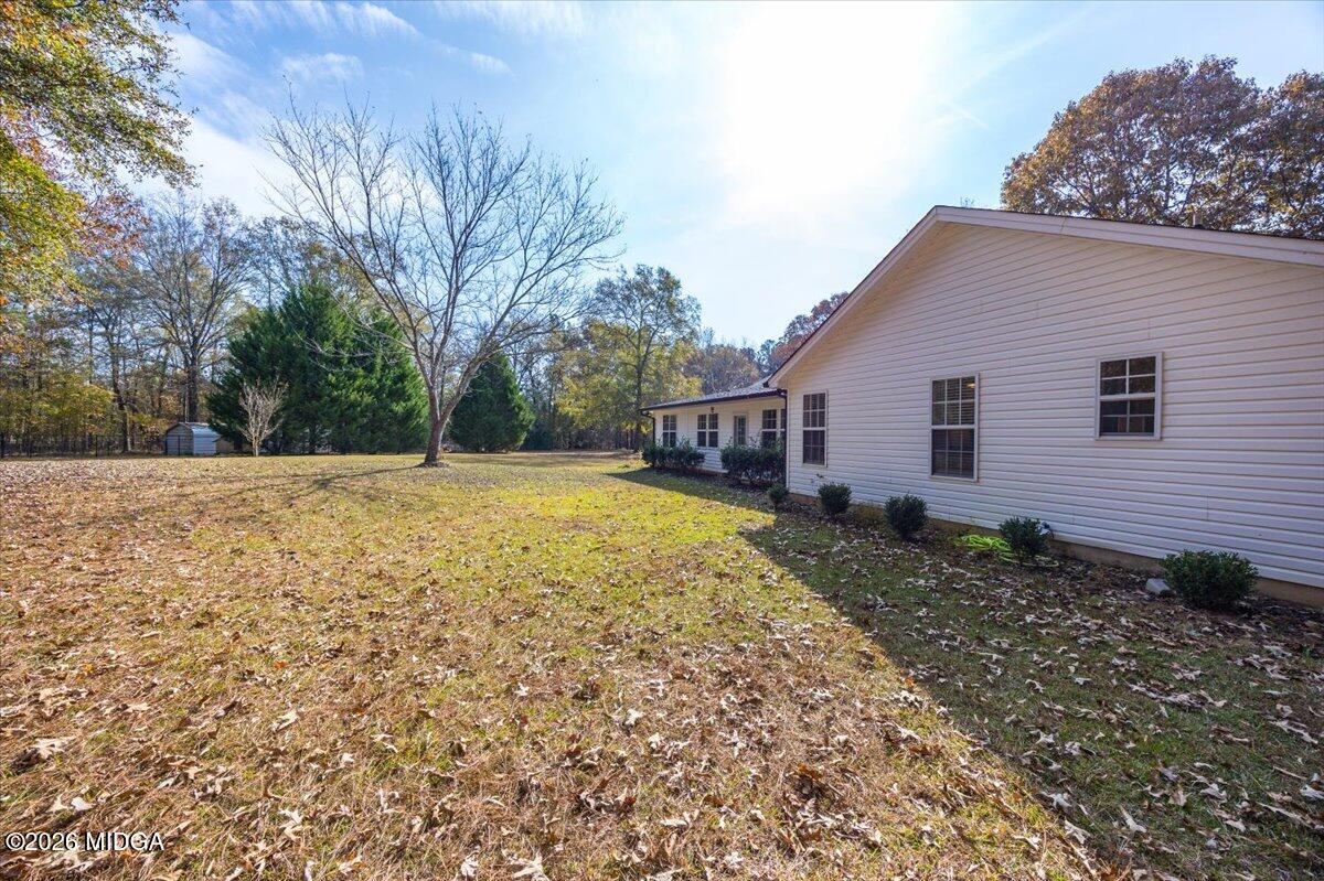 428 Fairview Church Road Forsyth, GA 31029 - Photo 33 of 35 a view of a house with a yard