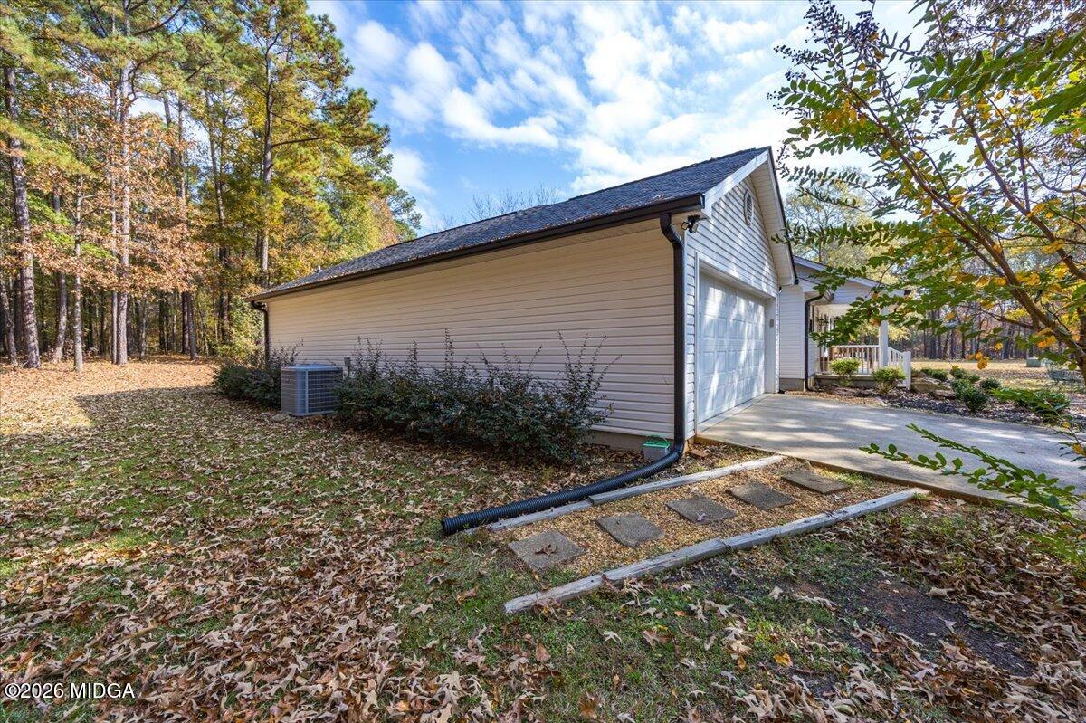 428 Fairview Church Road Forsyth, GA 31029 - Photo 34 of 35 a backyard of a house with lots of green space