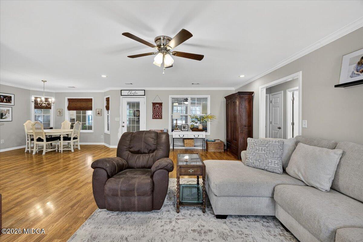428 Fairview Church Road Forsyth, GA 31029 - Photo 6 of 35 a living room with furniture and a view of kitchen