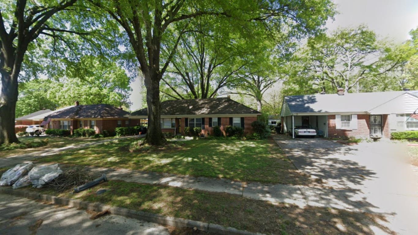 1561 Wilbec Road Memphis, TN 38117 - Photo 1 of 1 a front view of a house with garden