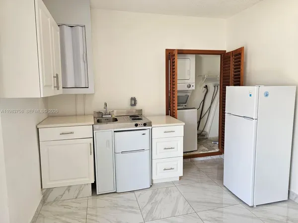 a room with dryer and washer