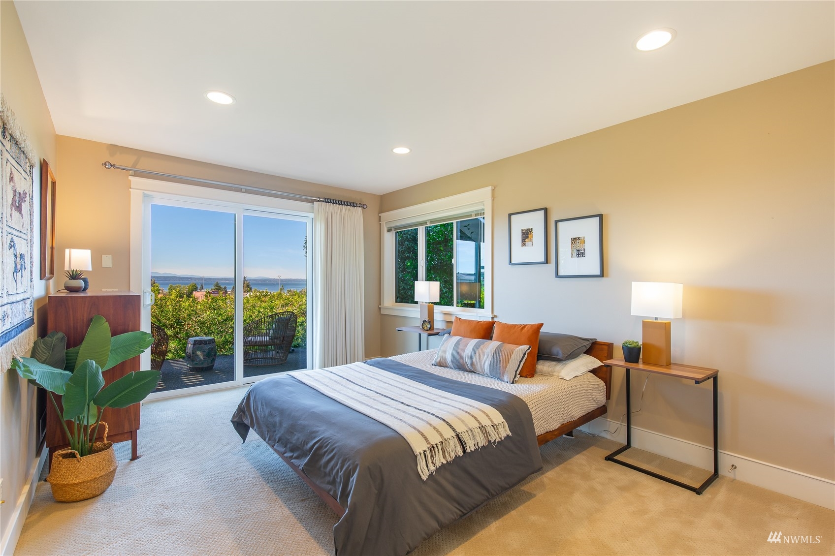 731 Bell Street Edmonds, WA 98020 - Photo 18 of 40 a bedroom with a bed and a large window