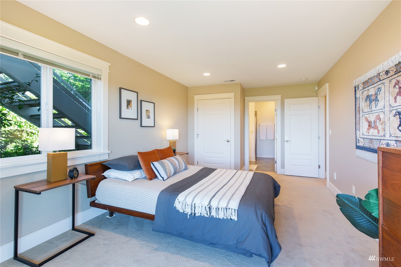 731 Bell Street Edmonds, WA 98020 - Photo 19 of 40 a bedroom with a bed and a couch