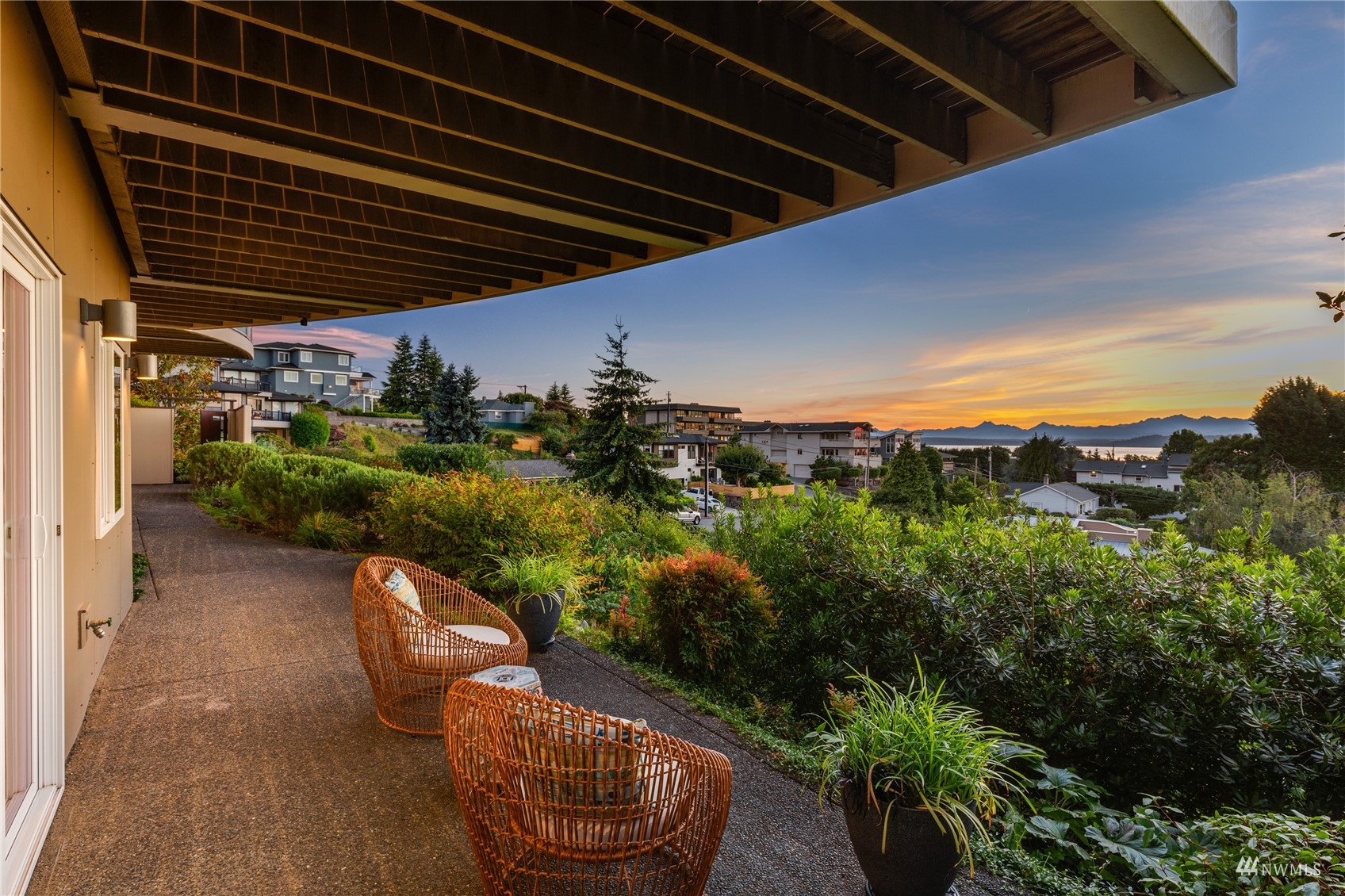 731 Bell Street Edmonds, WA 98020 - Photo 21 of 40 a view of a porch with furniture and a yard