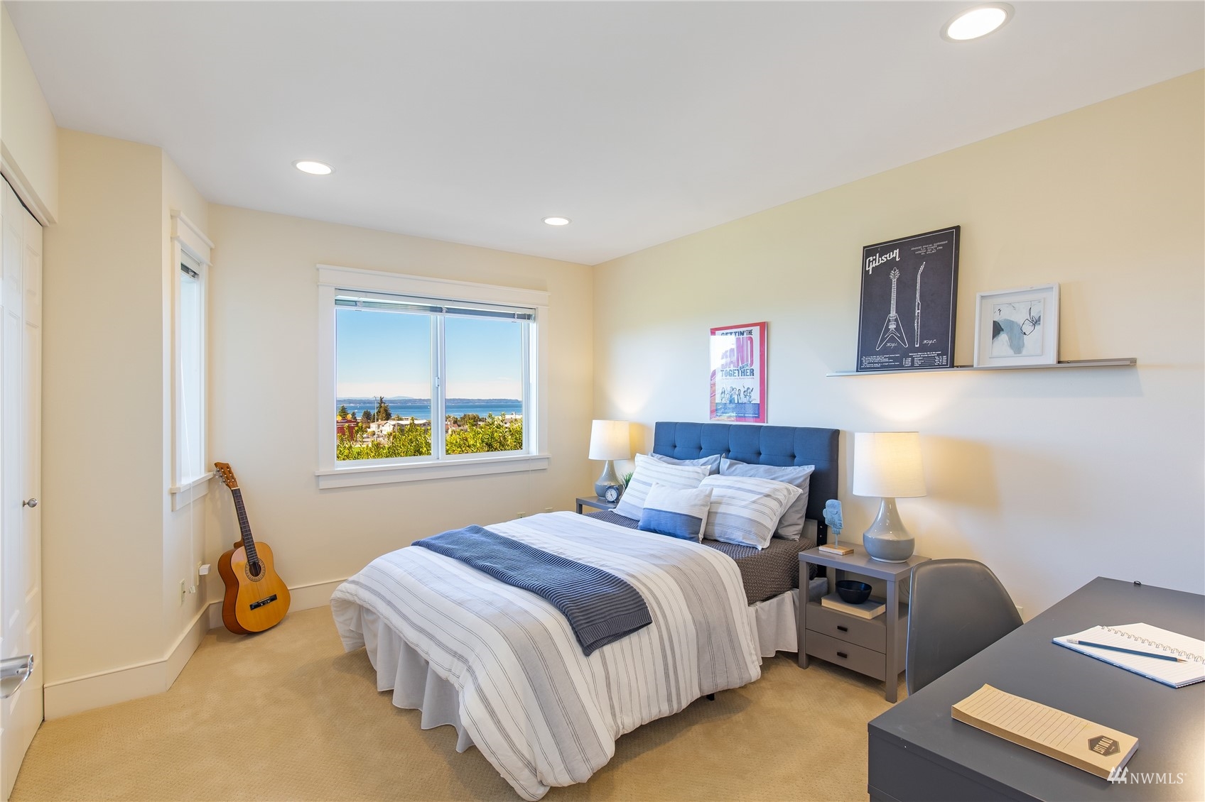 731 Bell Street Edmonds, WA 98020 - Photo 24 of 40 a bed room with a bed and a lamp