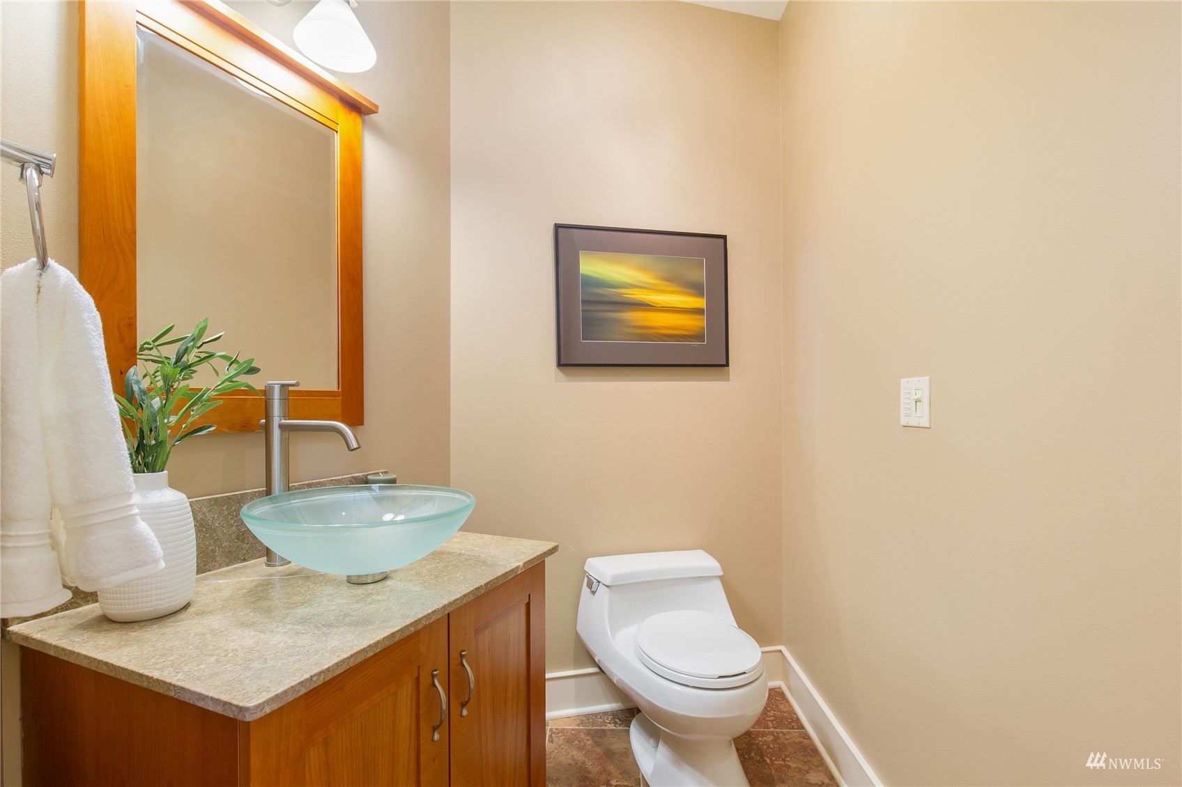 731 Bell Street Edmonds, WA 98020 - Photo 26 of 40 a bathroom with a granite countertop sink and a mirror