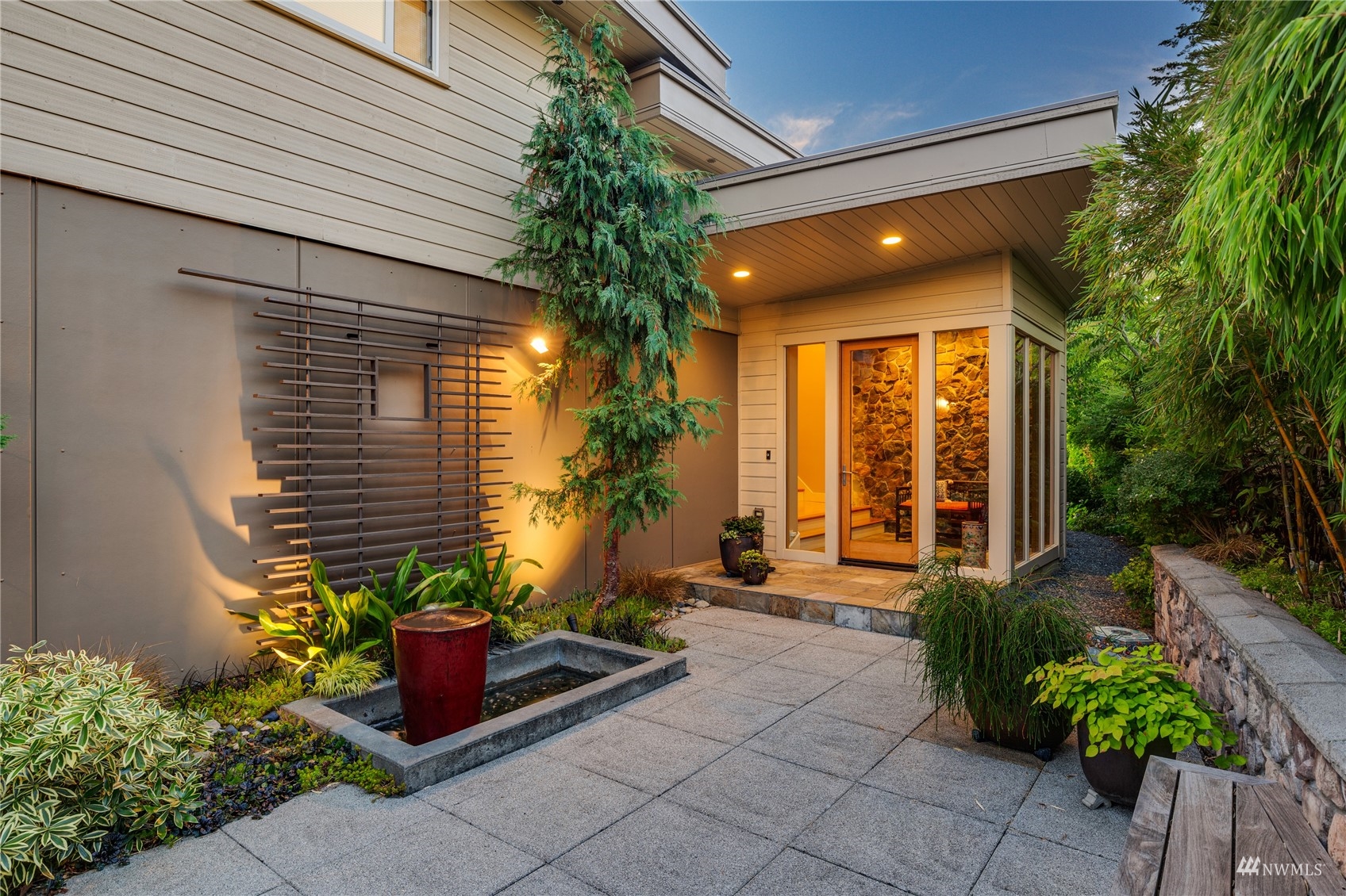 731 Bell Street Edmonds, WA 98020 - Photo 27 of 40 a potted plant sitting in front of a house