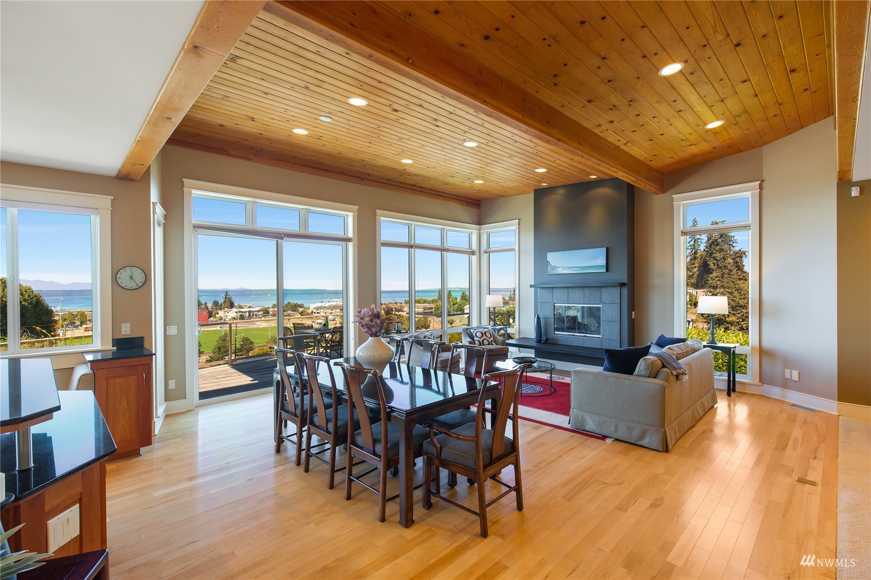 731 Bell Street Edmonds, WA 98020 - Photo 31 of 40 a view of a dining room with furniture window and wooden floor