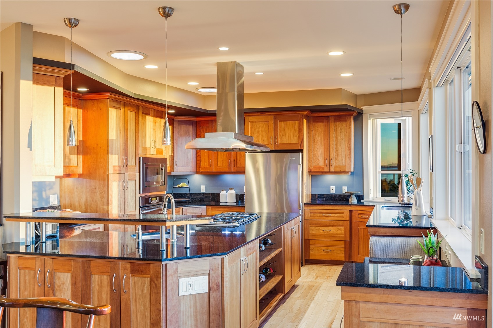 731 Bell Street Edmonds, WA 98020 - Photo 7 of 40 a kitchen with large windows and furniture
