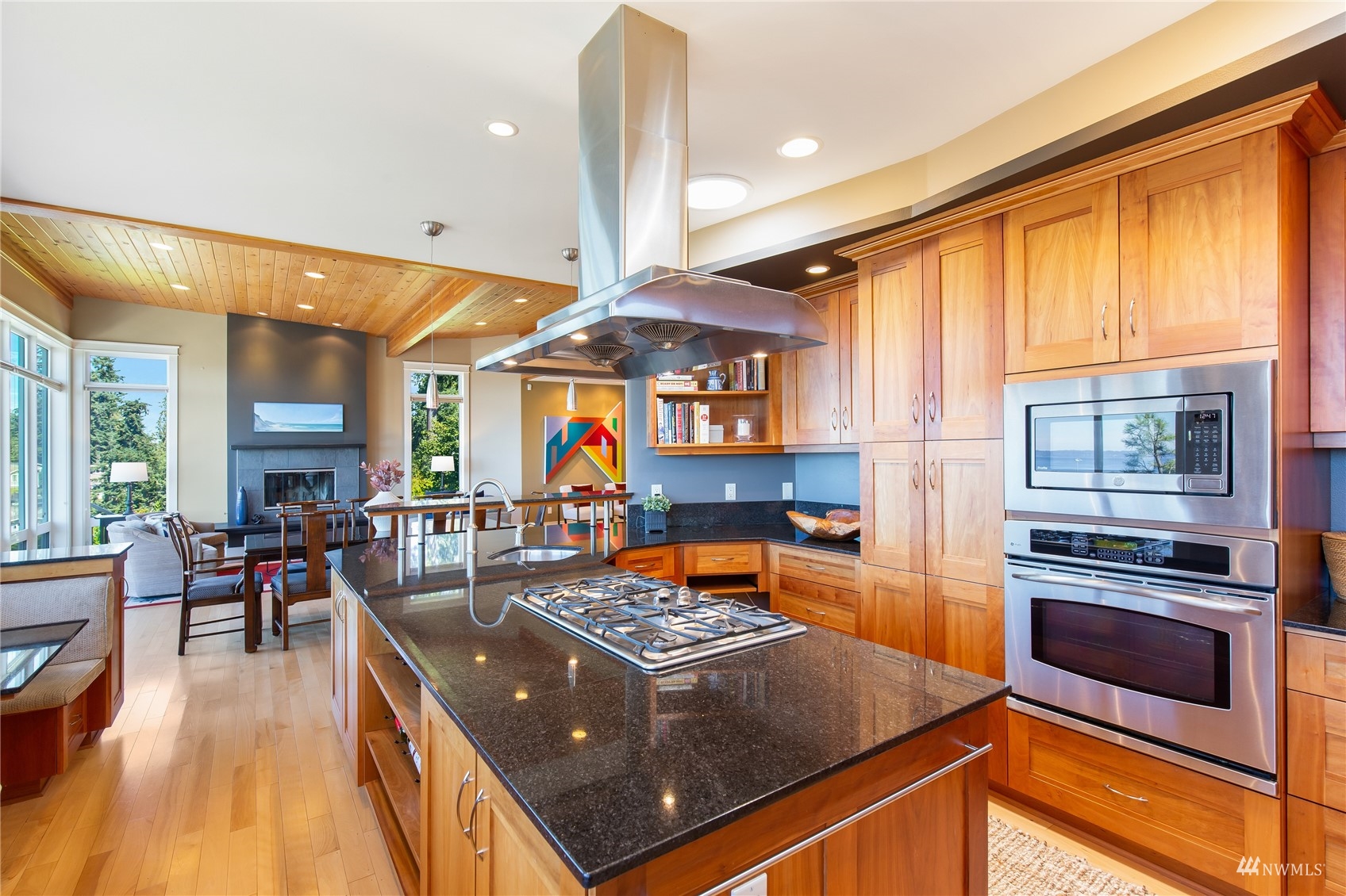 731 Bell Street Edmonds, WA 98020 - Photo 8 of 40 a kitchen with stainless steel appliances granite countertop a stove and a refrigerator