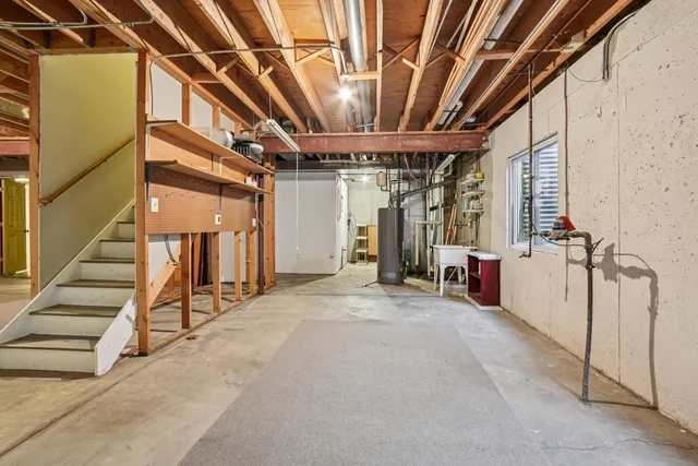 a view of an empty room with stairs