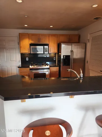 a view of room with window and wooden floor