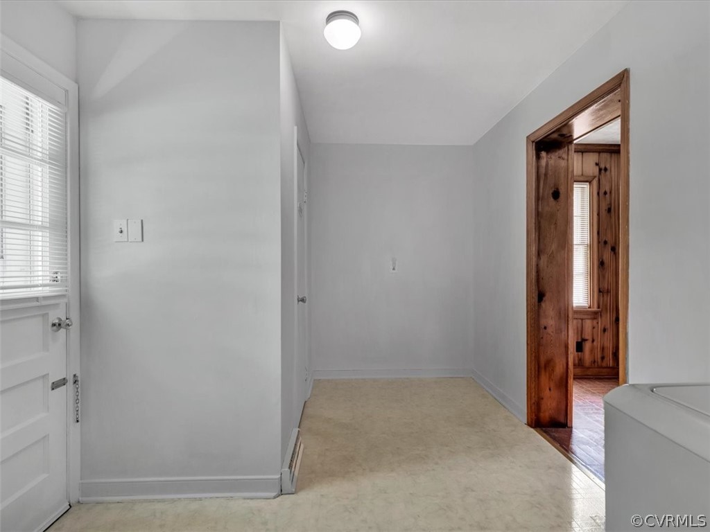 4140 Holcombe Road Richmond, VA 23234 - Photo 13 of 18 an empty room with windows