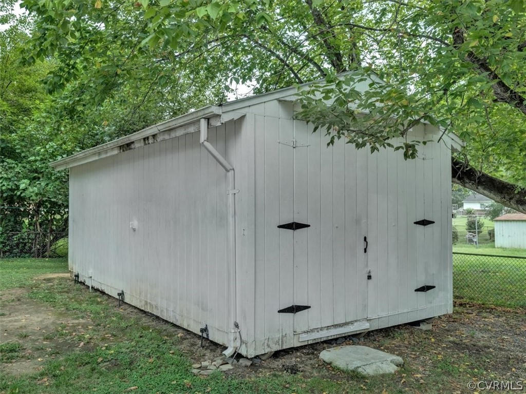 4140 Holcombe Road Richmond, VA 23234 - Photo 17 of 18 a wooden door in front of a house