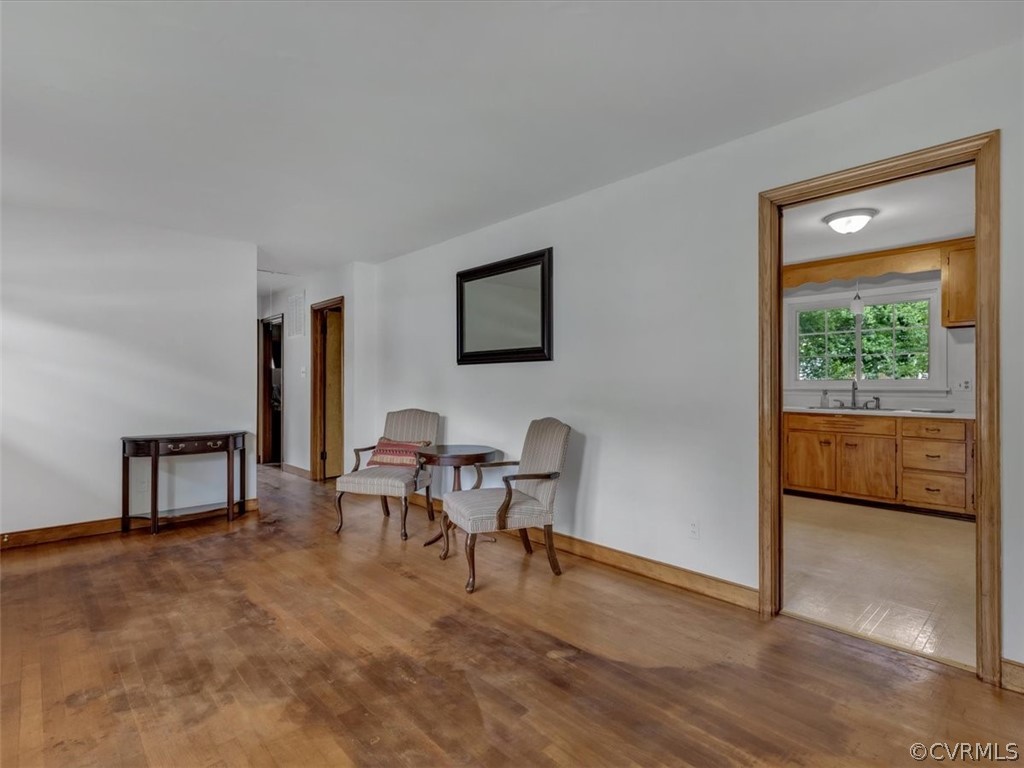 4140 Holcombe Road Richmond, VA 23234 - Photo 4 of 18 a view of a livingroom with furniture and a window
