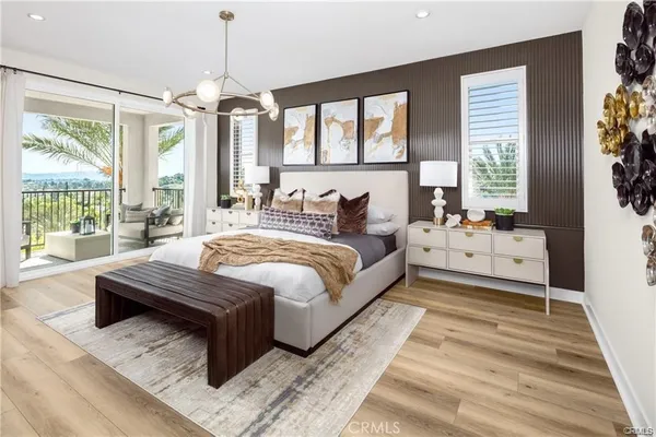 a spacious bedroom with a bed and a large window