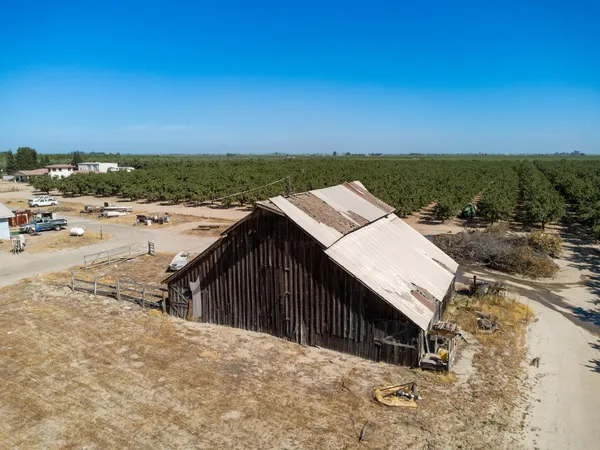 an aerial view of a yard with horses
